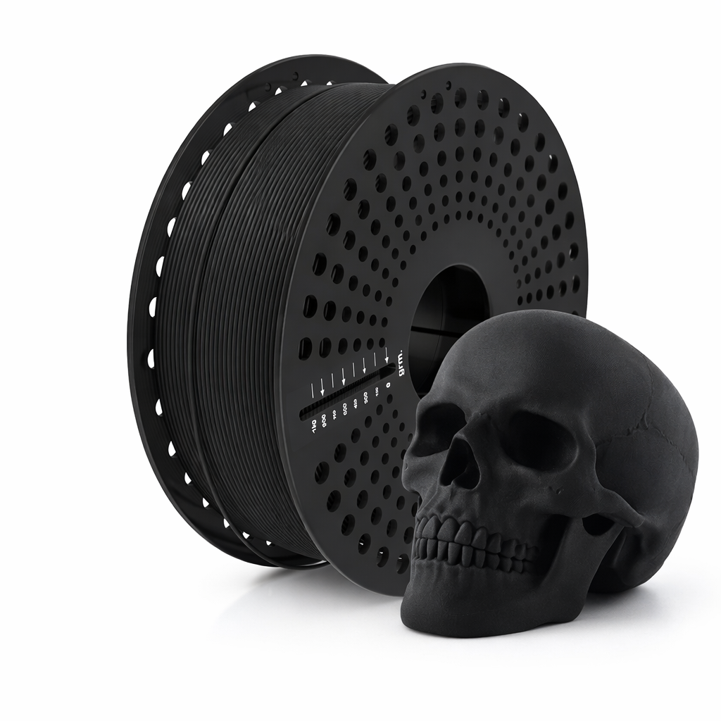 Matte black pla filament and a black 3D-printed skull on a white background